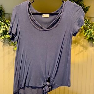 Navy blue shirt with cross cut in the middle